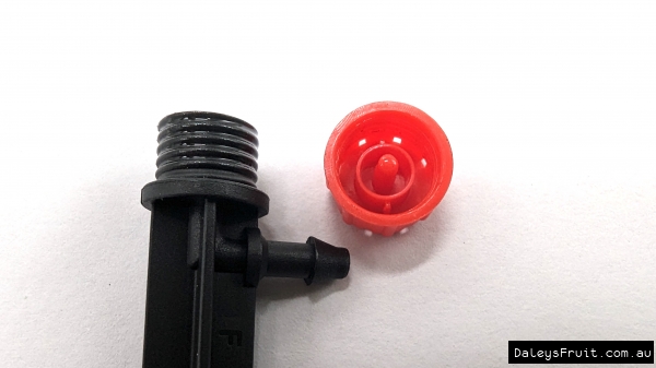 The red top allows for the drip water to come out. It can be completely screwed off showing the separate parts of the drip irrigation emitter