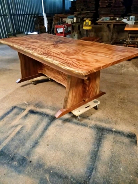 35 year old African mahogany tree crafted in Darwin by arborists Steve Parker into a table