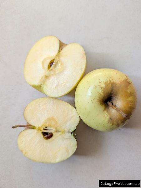 Golden Delicious apples fresh harvested in Stanthorpe, sliced for eating