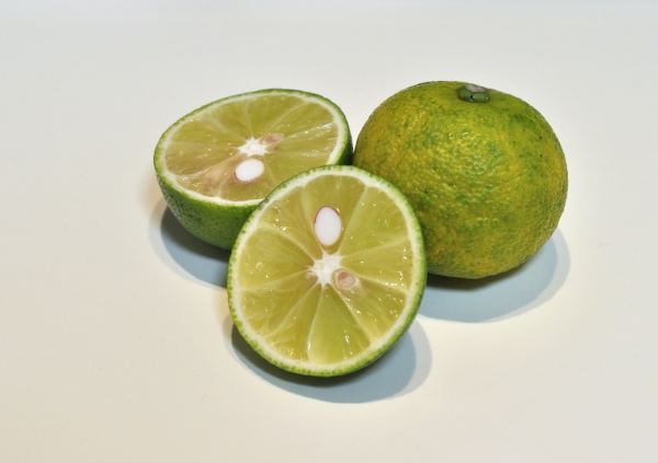 citrus sudachi fruit cut in half